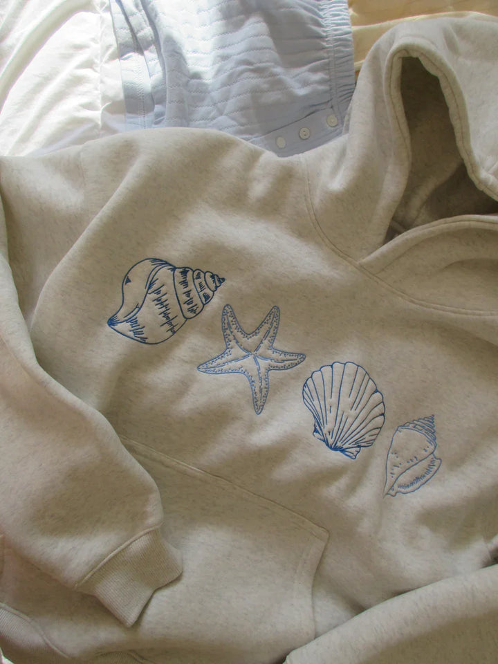 Marigold | Unisex sweatshirt with seashells